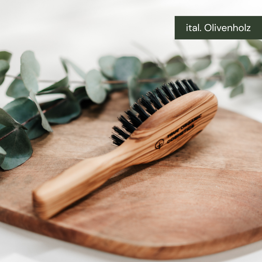The oval olive wood brush from True Organic Cosmetics